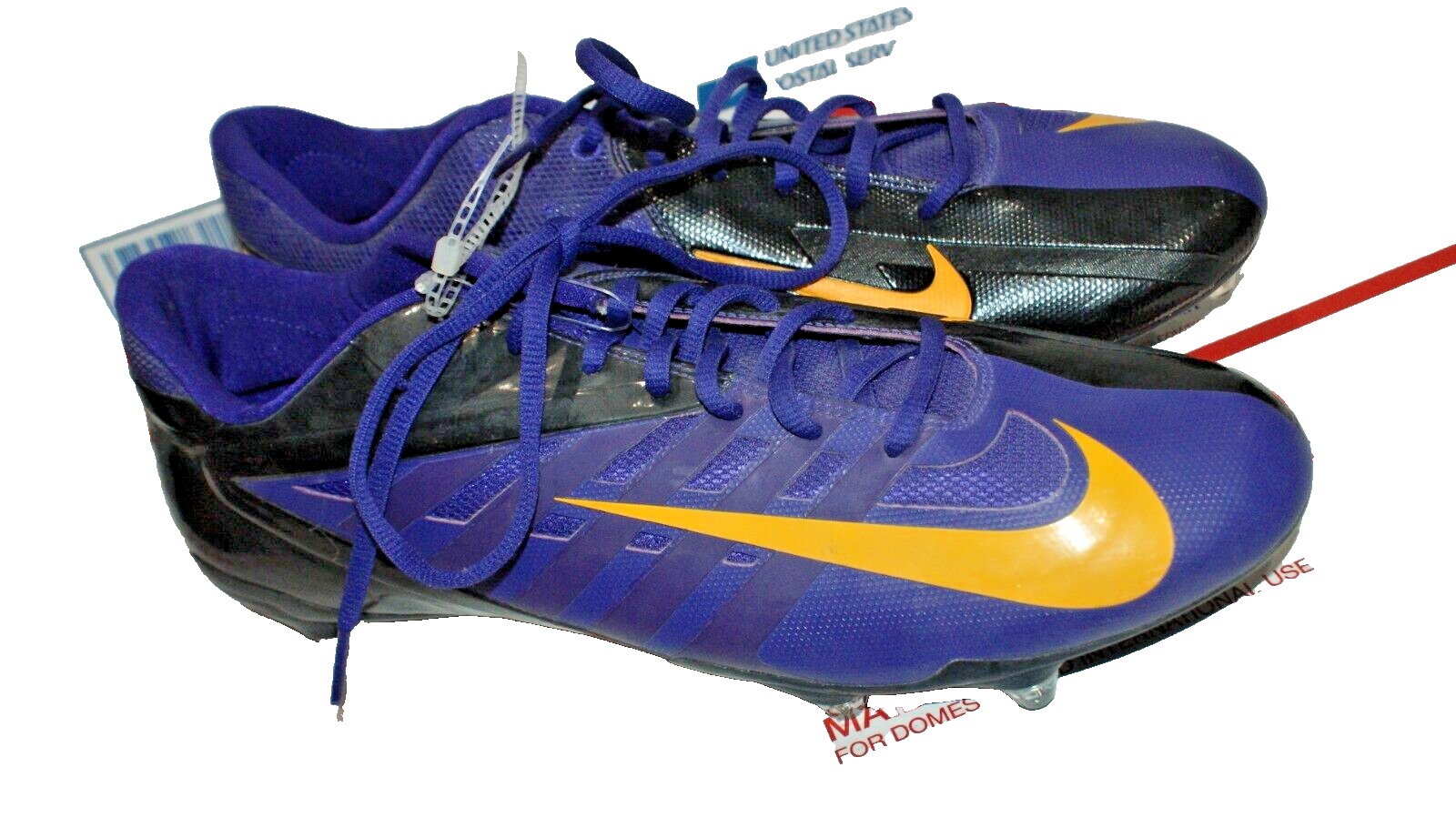 nike purple and gold football cleats